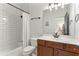 Modern bathroom with subway tile surround the shower/tub and classic vanity at 5705 Odell St, Cumming, GA 30040