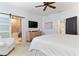 Bright bedroom with a view of the elegant bathroom with a free standing tub at 5705 Odell St, Cumming, GA 30040