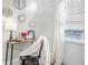 Cozy home office with a wood desk, black accents, and decorative mirrors on the wall at 2840 Peachtree Nw Rd # 301, Atlanta, GA 30305