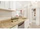 Functional eat-in kitchen with granite countertops and stainless steel appliances at 2840 Peachtree Nw Rd # 301, Atlanta, GA 30305