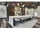 Stylish bar area with seating, modern lighting, and sleek countertops at 3324 Peachtree Ne Rd # 2903, Atlanta, GA 30326