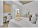 Well-lit bedroom with a desk area, comfortable bed, and minimalist design at 3324 Peachtree Ne Rd # 2903, Atlanta, GA 30326