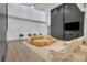 Modern resident lounge with comfortable seating and a large TV at 3324 Peachtree Ne Rd # 2903, Atlanta, GA 30326
