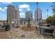 Outdoor patio with grill and seating, perfect for entertaining guests at 3324 Peachtree Ne Rd # 2903, Atlanta, GA 30326