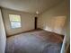 Bedroom showcasing natural light, carpet flooring, and neutral color walls at 3998 Elm St, Atlanta, GA 30341