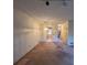 Spacious living room featuring neutral walls, carpet flooring and light fixtures at 3998 Elm St, Atlanta, GA 30341