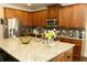 Kitchen with granite countertops and stainless steel appliances at 40 Adler Pl, Covington, GA 30016