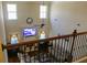 Bright living room featuring high ceilings, a ceiling fan, large windows and comfortable seating at 40 Adler Pl, Covington, GA 30016