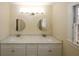 Bathroom featuring double sinks, granite countertops, and vanity at 4995 Greentree Trl, College Park, GA 30349