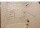 Bathroom with marble tile shower, shower head and fixtures, soap niche and bathtub at 4995 Greentree Trl, College Park, GA 30349