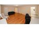 Large bedroom with wood floors, access to a bathroom, and plenty of natural light at 4995 Greentree Trl, College Park, GA 30349