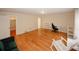 Bedroom featuring wood floors, a desk, and ample space for flexible arrangements at 4995 Greentree Trl, College Park, GA 30349