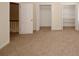 Spacious bedroom with three closets and doorway to stairwell at 4995 Greentree Trl, College Park, GA 30349