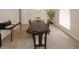 Well-lit dining room featuring a long dining table and view of the window and exterior at 4995 Greentree Trl, College Park, GA 30349