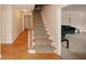 Inviting entryway with hardwood floors, carpeted stairs, and access to a spacious living room at 4995 Greentree Trl, College Park, GA 30349