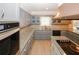 Kitchen featuring grey cabinets, granite countertops, a window over the sink, and stainless steel appliances at 4995 Greentree Trl, College Park, GA 30349