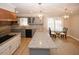Bright kitchen with granite counters, stainless steel appliances, kitchen island and hardwood floors at 4995 Greentree Trl, College Park, GA 30349