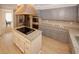 Spacious kitchen featuring grey cabinets, granite countertops, stainless steel appliances and a center island at 4995 Greentree Trl, College Park, GA 30349