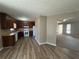 This bright kitchen features wood cabinets, modern appliances, and neutral paint at 5872 Fox Run, Rex, GA 30273