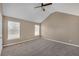 Bedroom showcasing a neutral color scheme, comfortable carpeting, and bright natural light, with a ceiling fan at 81 Sheffield Ln, Powder Springs, GA 30127