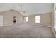 Carpeted main bedroom with large windows and an ensuite bathroom, creating a private retreat at 81 Sheffield Ln, Powder Springs, GA 30127