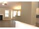 Open-concept living room boasts wood flooring, a fireplace, and plenty of natural light at 84 Jennifer Ln, Covington, GA 30016