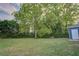 Large backyard with mature trees for shade at 1246 Bell Ave, East Point, GA 30344