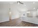 Spacious open-concept living area with wood flooring, recessed lighting, and high, vaulted ceilings at 1246 Bell Ave, East Point, GA 30344
