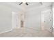 Spacious bedroom with a ceiling fan and access to the walk-in closet and ensuite bathroom at 1570 Halbrook Pl, Marietta, GA 30008