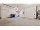 Spacious garage with concrete floors offers ample room for parking and storage solutions at 1570 Halbrook Pl, Marietta, GA 30008