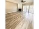 Spacious living room featuring a fireplace, wood-look floors and sliding glass doors at 51 Highoak Ne Dr # 12, Marietta, GA 30066