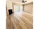 Spacious living room featuring a fireplace, wood-look floors and sliding glass doors at 51 Highoak Ne Dr # 12, Marietta, GA 30066