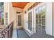 Cozy covered balcony with a seating area, perfect for relaxing and enjoying the outdoors at 825 Highland Ln # 1105, Atlanta, GA 30306