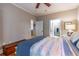 Bedroom with hardwood floors, neutral walls, and access to the bathroom at 825 Highland Ln # 1105, Atlanta, GA 30306