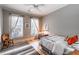 Serene bedroom featuring large windows, hardwood flooring, and neutral paint color at 825 Highland Ln # 1105, Atlanta, GA 30306
