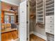 Walk in closet and private door to the primary bedroom at 825 Highland Ln # 1105, Atlanta, GA 30306