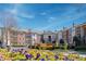 Beautiful condominium complex featuring manicured landscaping and colorful flowers in the springtime at 825 Highland Ln # 1105, Atlanta, GA 30306