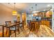 Bright eat-in kitchen featuring a stainless steel refrigerator and a center island with bar stool seating at 825 Highland Ln # 1105, Atlanta, GA 30306