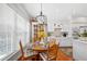 Breakfast nook featuring a wooden table set, natural light, and hardwood floors at 2330 Ventana Xing # 10, Marietta, GA 30062