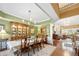 Elegant dining room with hardwood floors, chandelier, and seamless flow to living room at 2330 Ventana Xing # 10, Marietta, GA 30062