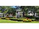 Charming gazebo surrounded by lush landscaping, colorful flowers, and mature trees in a neighborhood park at 2330 Ventana Xing # 10, Marietta, GA 30062