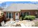 Charming stone patio with outdoor seating, perfect for enjoying outdoor dining and relaxation at 2330 Ventana Xing # 10, Marietta, GA 30062