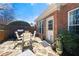 Beautiful stone patio featuring an outdoor dining set, perfect for entertaining at 2330 Ventana Xing # 10, Marietta, GA 30062