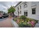 Outdoor dining at Bella Turo restaurant, surrounded by flowers and greenery, on a beautiful street at 2330 Ventana Xing # 10, Marietta, GA 30062