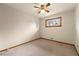 Neutral bedroom with a ceiling fan and a window providing natural light at 3406 Woodview Se Dr, Smyrna, GA 30082