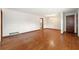 Bright living room with hardwood floors, white walls, and minimal ornamentation at 3406 Woodview Se Dr, Smyrna, GA 30082