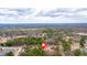 An aerial view showing a house location with a red pin near lush trees and a long open space at 4480 Highway 5, Douglasville, GA 30135