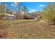 The home's backyard is very large and features both a shed and a covered deck at 4480 Highway 5, Douglasville, GA 30135