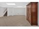 Basement with tile flooring, stairs, and storage at 4480 Highway 5, Douglasville, GA 30135