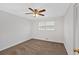 Bedroom features neutral walls, a ceiling fan, plush carpeting, and a window for natural light at 4480 Highway 5, Douglasville, GA 30135